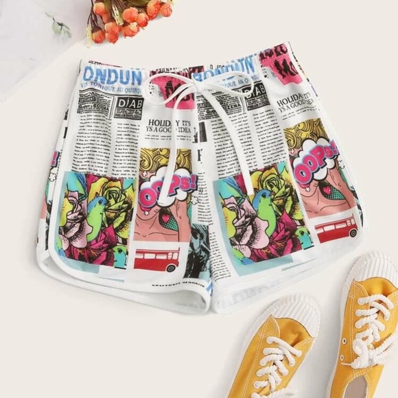 Pants - NWOT tie waist newspaper & pop art print shorts.